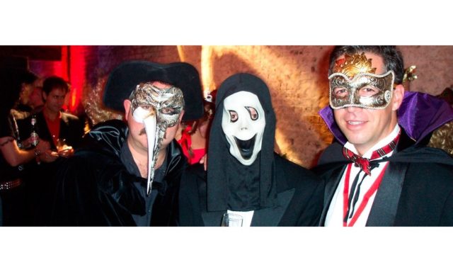 Three friends dressed in fancy dress at the Masked Ball in Cornwall